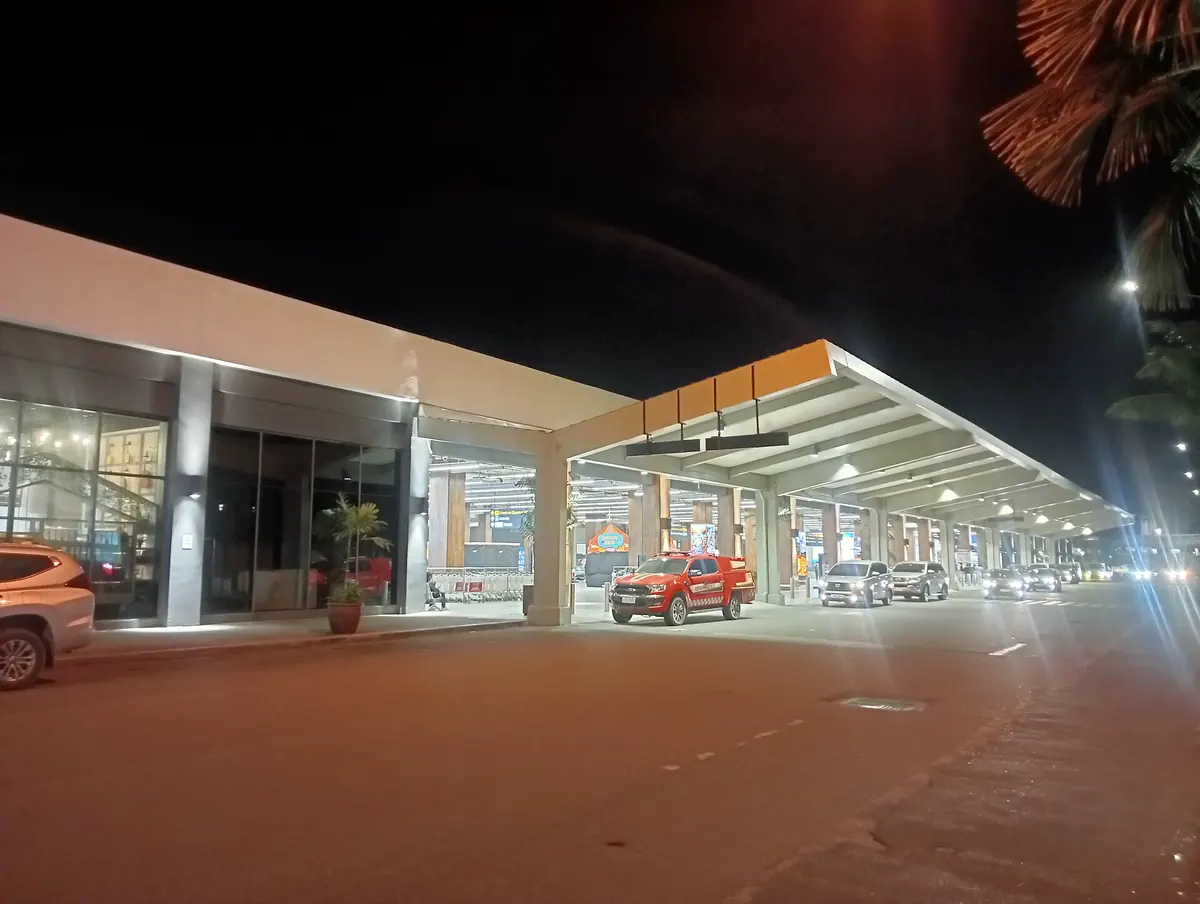 Mactan-Cebu International Airport Terminal 2 at night, with its timber-clad canopy